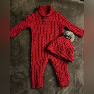 Never worn sweater romper with matching hat.